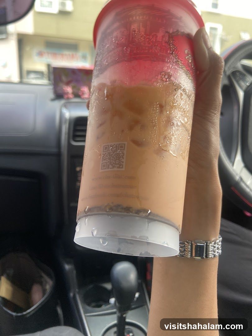 Thai Iced Tea in a Car