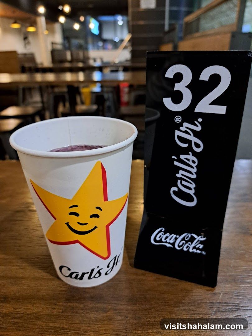 Carl's Jr. cup and table number