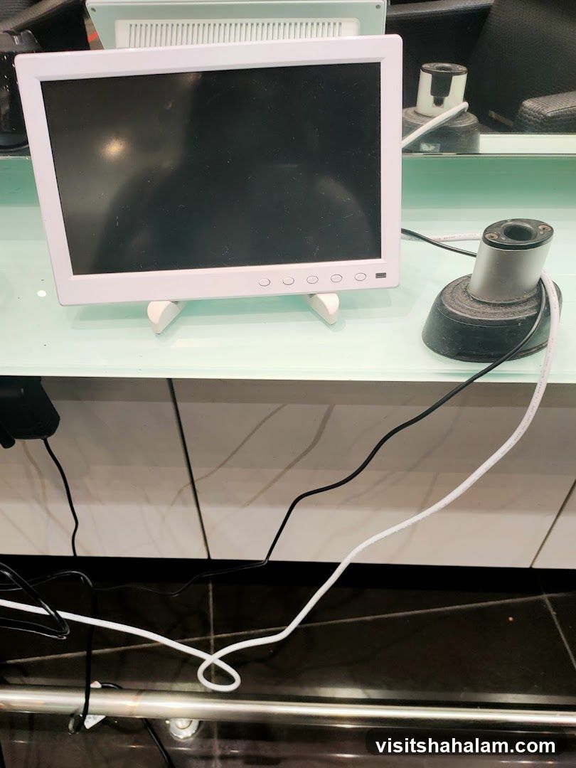 Computer monitor and accessories on a desk