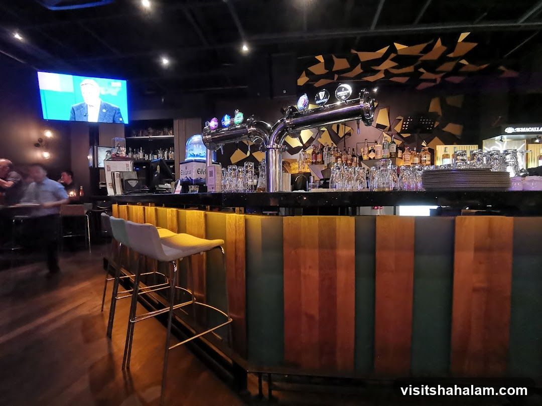 Bar Interior with Beer Taps and TV